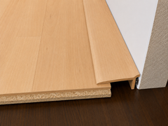 Beech floor edge trim bridge gap between laminate floor and skirting