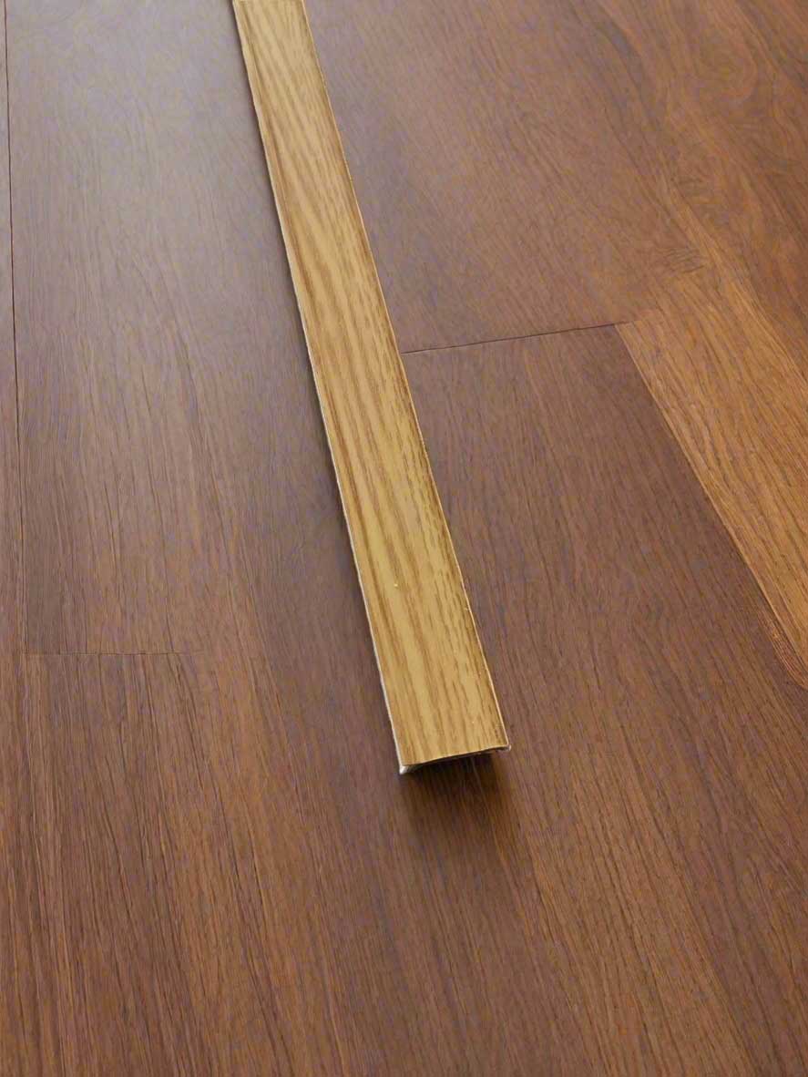 Medium oak floor edge trim bridge gap around edge of room