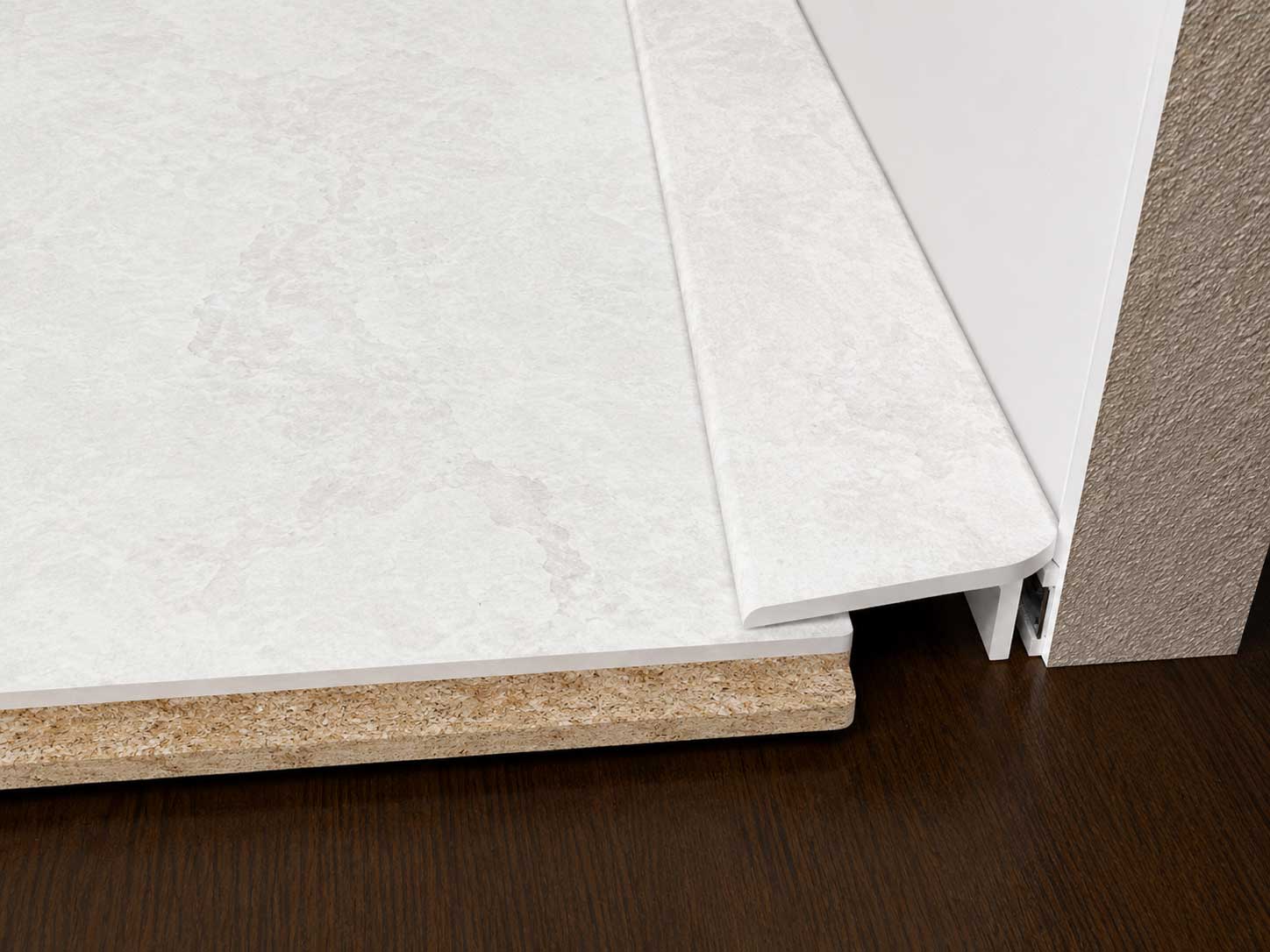 White slate floor edge trim bridge gap between floor and skirting
