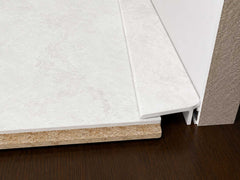 White slate floor edge trim bridge gap between floor and skirting